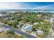 Charming property with a freshly painted exterior and lush landscaping, situated near water and offering serene views at 613 6Th E Ave, Bradenton, FL 34208