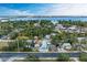 Charming property with a freshly painted exterior and lush landscaping, situated near water and offering serene views at 613 6Th E Ave, Bradenton, FL 34208