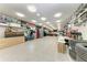 The expansive garage has epoxy flooring, bright lighting, shelving and plenty of open storage at 613 6Th E Ave, Bradenton, FL 34208