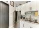 This efficient kitchenette features modern appliances, granite countertops, and ample cabinet space at 613 6Th E Ave, Bradenton, FL 34208