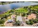 A community featuring a playground, splashpad, and open green space, ideal for Gathering-friendly fun with lake views at 6227 Golden Nettle Dr, Apollo Beach, FL 33572