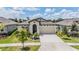 Charming one-story home with manicured lawn and inviting curb appeal at 6227 Golden Nettle Dr, Apollo Beach, FL 33572
