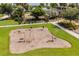 Outdoor fitness area with modern exercise equipment, perfect for an active lifestyle amidst beautiful green surroundings at 6227 Golden Nettle Dr, Apollo Beach, FL 33572