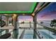 Beautiful balcony with glass floors and waterfront views, perfect for relaxation and entertainment at 6526 Surfside Blvd, Apollo Beach, FL 33572