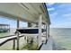 State-of-the-art covered boat lift providing secure waterfront vessel storage at 6526 Surfside Blvd, Apollo Beach, FL 33572