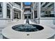 Elegant courtyard with a unique round spa and multi-level access to the luxury home at 6526 Surfside Blvd, Apollo Beach, FL 33572