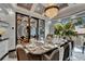 Beautifully appointed dining area with a large table, comfortable seating, and ample natural light at 6526 Surfside Blvd, Apollo Beach, FL 33572
