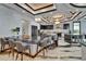 Modern kitchen with sleek countertops, stainless steel appliances, and ample seating at the island at 6526 Surfside Blvd, Apollo Beach, FL 33572