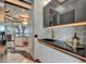 Elegant kitchen with quartz countertops, sleek cabinetry, and modern lighting fixtures at 6526 Surfside Blvd, Apollo Beach, FL 33572