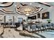 Gourmet kitchen featuring an oversized kitchen island, state-of-the-art appliances, and modern finishes at 6526 Surfside Blvd, Apollo Beach, FL 33572