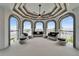 Elegant waterfront lounge features comfortable seating, arched doorways, and views of the ocean at 6526 Surfside Blvd, Apollo Beach, FL 33572