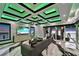Modern living room with sleek furniture, stylish marble floors, and scenic waterfront views at 6526 Surfside Blvd, Apollo Beach, FL 33572