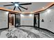Expansive living space with marble floors, recessed lighting, and modern design elements at 6526 Surfside Blvd, Apollo Beach, FL 33572
