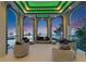 Stylish seating arrangement in a comfortable lounge with stunning waterfront views and ample natural light at 6526 Surfside Blvd, Apollo Beach, FL 33572