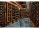 Spacious wine cellar with custom shelving, display lighting, and ample storage for an extensive wine collection at 6526 Surfside Blvd, Apollo Beach, FL 33572