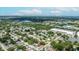 An aerial view shows the home in a residential neighborhood close to Tampa Bay and downtown St. Petersburg, Florida at 6816 S Hesperides St, Tampa, FL 33616