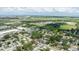 An aerial view shows the home in a residential neighborhood close to St. Pete–Clearwater International Airport at 6816 S Hesperides St, Tampa, FL 33616