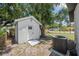 Backyard shed providing extra storage space on the property at 6816 S Hesperides St, Tampa, FL 33616