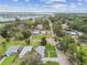 Aerial view of a home showcasing its manicured landscaping, brick driveway, and well-maintained exterior at 7224 Park S St, St Pete Beach, FL 33707