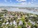 Stunning aerial view of a waterfront community with lush greenery and beautiful homes near the bay at 7224 Park S St, St Pete Beach, FL 33707