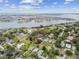 Beautiful aerial view of the waterfront neighborhood homes with easy access to the bay and nearby islands at 7224 Park S St, St Pete Beach, FL 33707