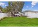 Lush backyard featuring a gazebo, manicured lawn, and a private fenced-in yard at 7224 Park S St, St Pete Beach, FL 33707