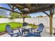 Beautiful outdoor space with gazebo, lush green lawn, and privacy fencing at 7224 Park S St, St Pete Beach, FL 33707