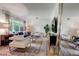 Bright and spacious living room with stylish furniture, natural light, and an inviting atmosphere at 7224 Park S St, St Pete Beach, FL 33707