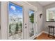 Dining room features sliding doors that provide access to the outdoor patio at 7224 Park S St, St Pete Beach, FL 33707