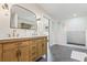 Spa-like bathroom boasts double vanity, shower, and tile floors at 731 38Th N Ave, St Petersburg, FL 33704