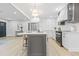 Spacious kitchen with a center island, stainless steel appliances, and open layout design at 731 38Th N Ave, St Petersburg, FL 33704