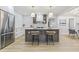 Gourmet kitchen features a central island with seating, stainless appliances, and custom cabinetry at 731 38Th N Ave, St Petersburg, FL 33704