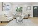 Cozy living room with ample seating, stylish decor, and a view of the outdoors at 731 38Th N Ave, St Petersburg, FL 33704