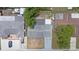 Aerial view of the property with roof, driveway and landscaping at 7330 Abalone Dr, Port Richey, FL 34668