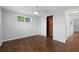Cozy bedroom with hardwood floors, ceiling fan, and closet space at 7330 Abalone Dr, Port Richey, FL 34668