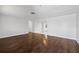 Spacious living room with hardwood flooring and plenty of natural light at 7330 Abalone Dr, Port Richey, FL 34668