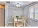 Cozy dining area with seating for four, perfect for intimate meals at 7564 Bayshore Dr # 202, Treasure Island, FL 33706