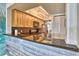 Contemporary kitchen featuring sleek countertops and ample cabinet space at 7564 Bayshore Dr # 202, Treasure Island, FL 33706