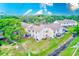 Aerial view of a condo complex featuring a spacious backyard at 7823 Hardwick Dr # 224, New Port Richey, FL 34653