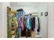 Organized walk-in closet with clothing racks and shelves for optimal storage solutions at 7823 Hardwick Dr # 224, New Port Richey, FL 34653