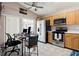 Kitchen view with stainless steel appliances and an adjacent desk at 814 Cape Cod Cir, Valrico, FL 33594