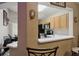 Open kitchen view from the dining area, showcasing warm wood cabinetry and modern appliances at 814 Cape Cod Cir, Valrico, FL 33594