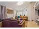 Spacious living room featuring tile floors and comfortable couches, perfect for gatherings at 814 Cape Cod Cir, Valrico, FL 33594
