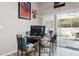 A home office features a view of the pool and sliding glass doors at 814 Cape Cod Cir, Valrico, FL 33594