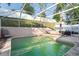 Backyard pool with screened enclosure and patio area, perfect for outdoor living at 814 Cape Cod Cir, Valrico, FL 33594