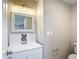 Bathroom featuring a sink, a mirror, and neutral walls at 8329 Gulf Way, Hudson, FL 34667