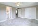 Bright bedroom with double closet and marble-look floors at 8329 Gulf Way, Hudson, FL 34667