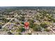 Aerial view showcases the property's location within a lush, established neighborhood at 9053 Hickory Cir, Tampa, FL 33615