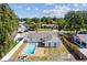 Aerial view of home featuring a large backyard pool at 9053 Hickory Cir, Tampa, FL 33615