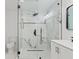 Bathroom with marble tile shower and modern fixtures at 9053 Hickory Cir, Tampa, FL 33615